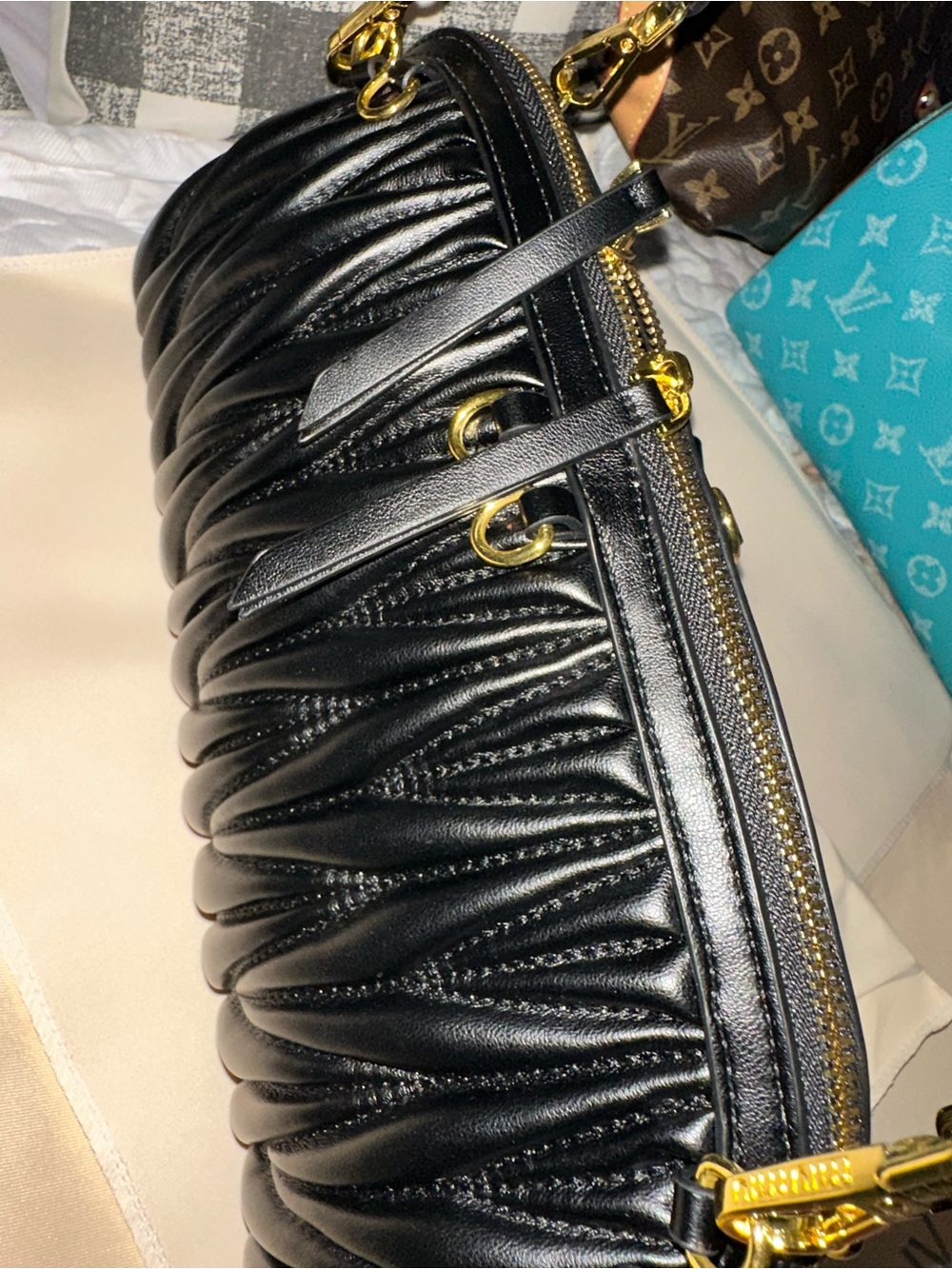 Black crossbody Women's Bag with Gold Hardware. Not authentic